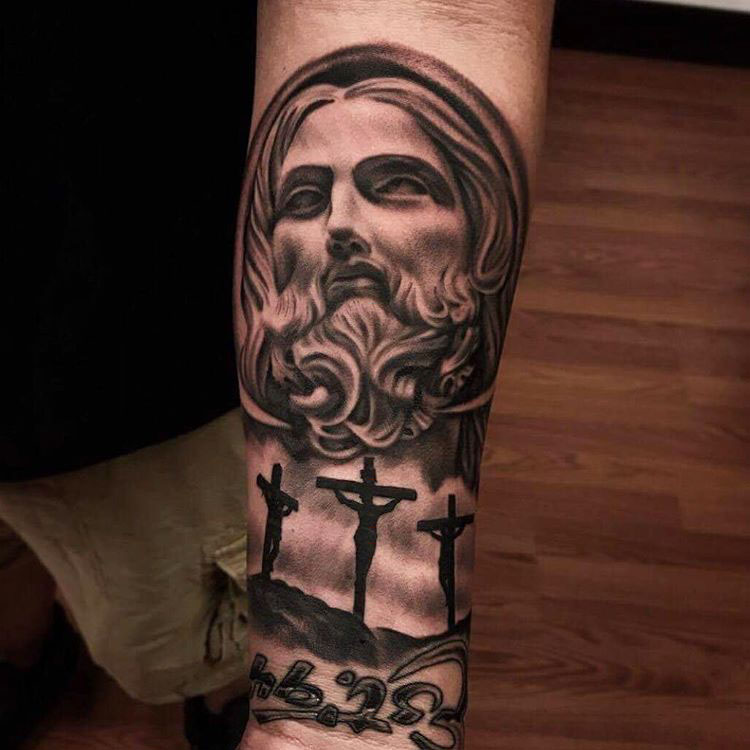 Cruxes jesus tattoo on arm religious